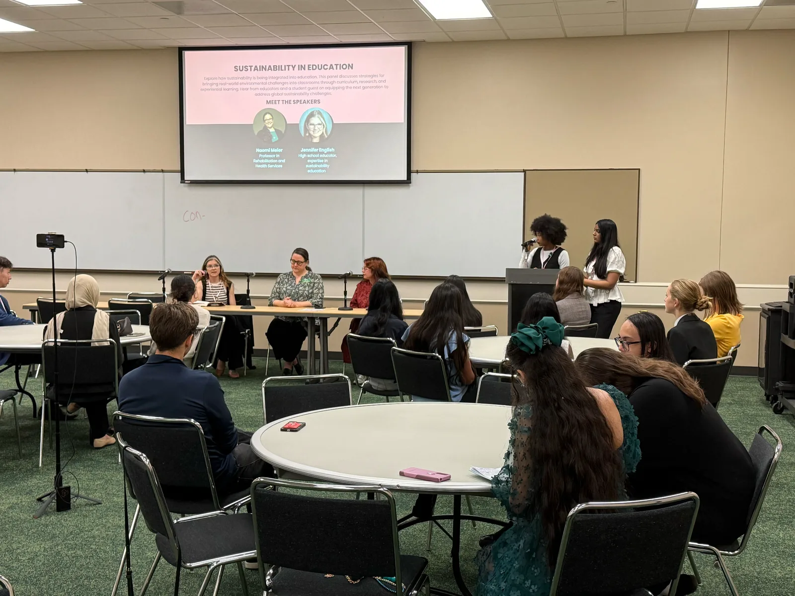 Students and educators discussing sustainability at an Ethos conference